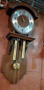 Antieke hang klok, Ophalen