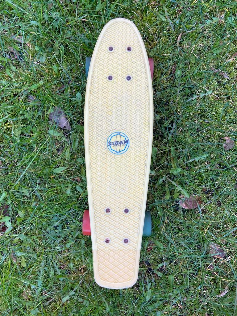 Nijdam Pennyboard geel met gekleurde wielen, Sport en Fitness, Skateboarden, Ophalen of Verzenden, Gebruikt, Skateboard