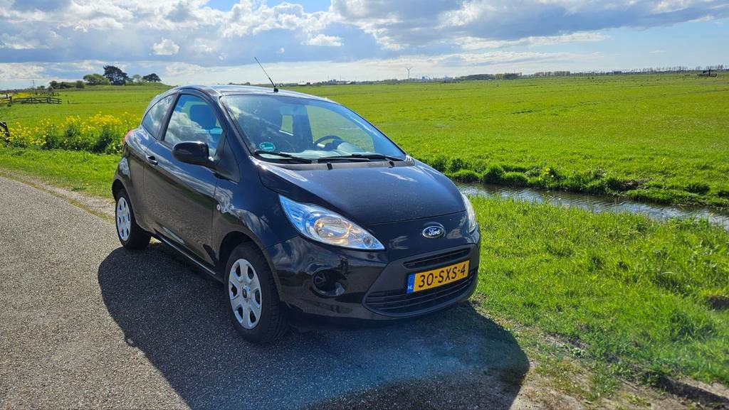 Ford Ka 1.2 69pk 2012 Zwart, Auto's, Voorwielaandrijving, 1242 cc, 4 cilinders, 4 stoelen
