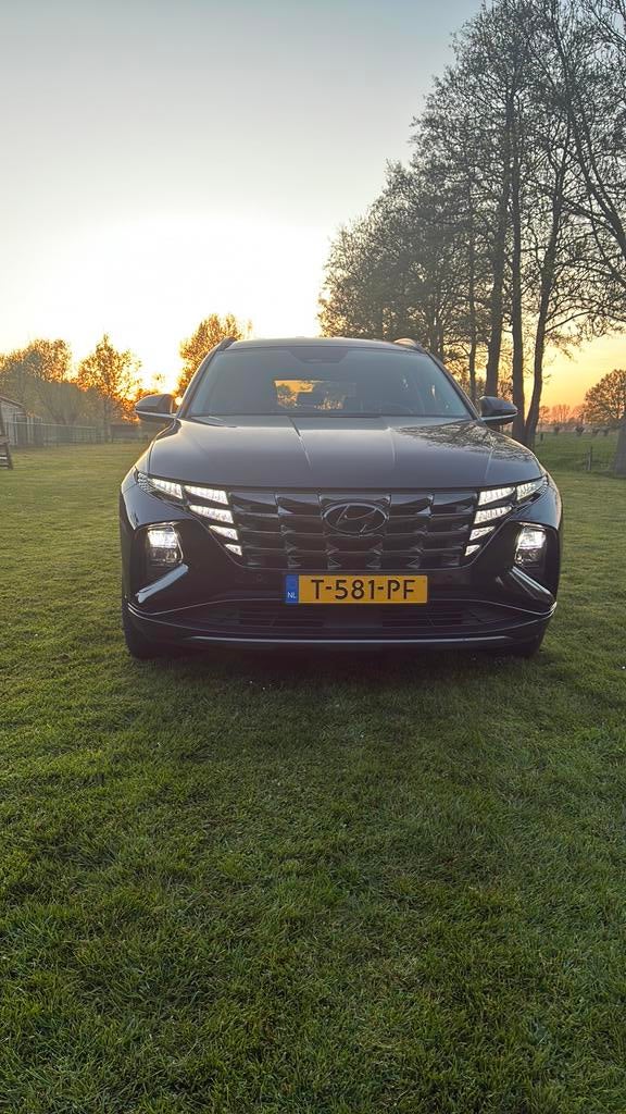 Hyundai Tucson 1.6 T-gdi Hybrid Premium Aut. 2023 Zwart, Auto's, Hyundai, 4 cilinders, 179 pk, 1650 kg, Zwart