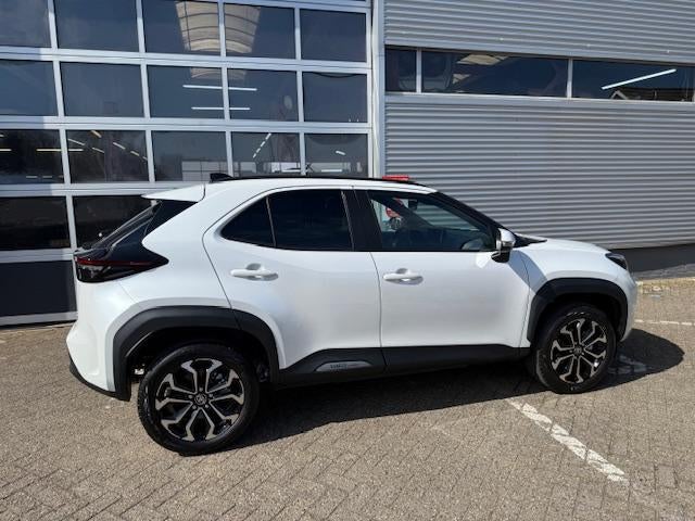Toyota Yaris Cross 1.5 VVT-I Hybrid 130pk Dynamic Winterpack, Auto's, Toyota, Gebruikt, Stoelverwarming, Wit, 1490 cc
