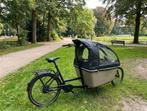 Elektrische Dolly bakfiets met regentent