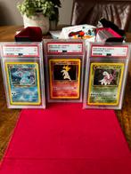 Typhlosion / Meganium / Feraligatr – Neo Genesis (PSA 7), Ophalen of Verzenden, Zo goed als nieuw, Meerdere kaarten