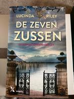 Lucinda Riley - De zeven zussen, Lucinda Riley, Ophalen of Verzenden, Zo goed als nieuw, Nederland