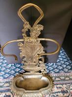 Bronzen paraplustandaard", Ophalen