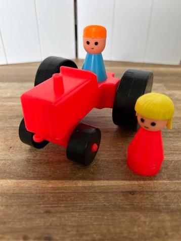 Tractor met 2 poppetjes beschikbaar voor biedingen