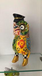 Grotere uil van Toms Drag, Ophalen