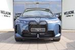 BMW iX xDrive60 M Sport / Panoramadak Sky Lounge / Trekhaak, Auto's, BMW, Automaat, Stoelverwarming, Bruin, IX