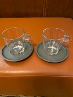 Nespresso glazen kopjes met schotels, Huis en Inrichting, Keuken | Servies, Ophalen of Verzenden, Effen, Kop(pen) en/of Schotel(s)