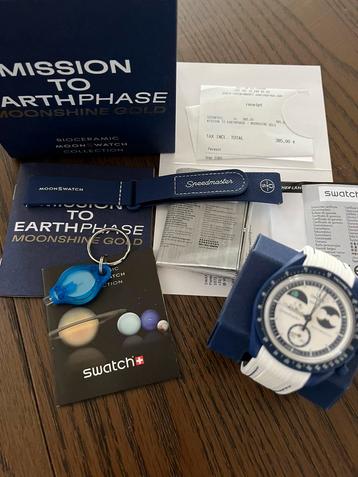 omega + swatch moonshine gold beschikbaar voor biedingen