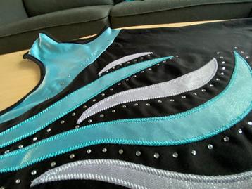 Turnpakje - maat 152 beschikbaar voor biedingen