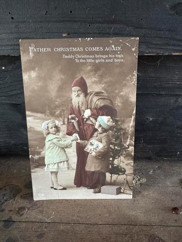 Oude kaart, kerstman brengt cadeautjes beschikbaar voor biedingen