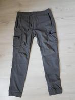 Heren polyester cargo broek in size medium, Ophalen of Verzenden, Zo goed als nieuw, Maat 48/50 (M), Grijs