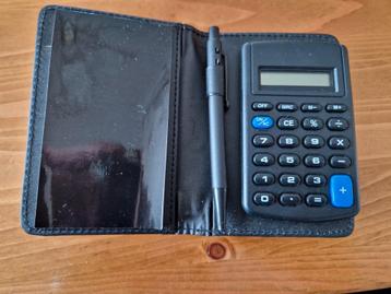 Rekenmachine in net hoesje  beschikbaar voor biedingen