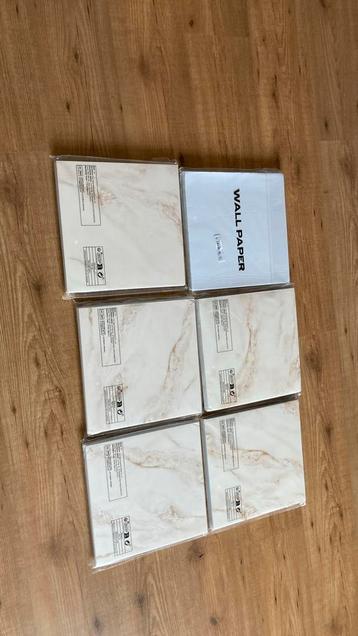 6 pakken per 10 stuks verpakt plaktegels beschikbaar voor biedingen