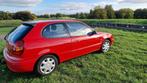 Toyota Corolla 1.6 HB Linea Terra 1999 Rood, Auto's, Toyota, 4 cilinders, Corolla, Origineel Nederlands, Handgeschakeld