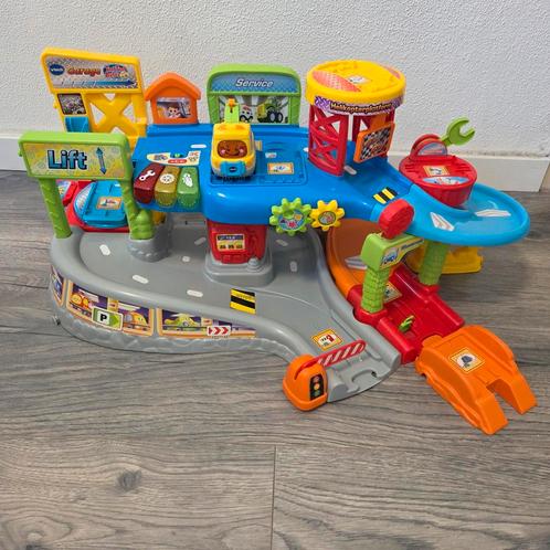 VTech Toet Toet Auto Garage met Auto, Kinderen en Baby's, Speelgoed | Babyspeelgoed, Gebruikt, Auto, Met licht, Met geluid, Met wieltjes