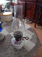 Oude olielamp met bloemmotief, Ophalen