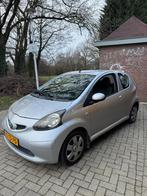 Toyota Aygo 1.0 12V Vvt-i 3DRS MMT 2006 Grijs, Auto's, Stof, Zwart, 68 pk, Origineel Nederlands
