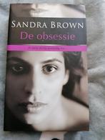 De obsessie - Sandra Brown, Gelezen, Ophalen of Verzenden, Nederland, Sandra Brown