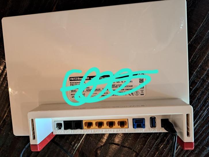 FRITZ!box 7581, Computers en Software, Routers en Modems, Zo goed als nieuw, Router, Ophalen of Verzenden