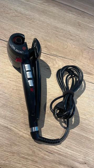 BaByliss “Curl Secret” automatische krultang beschikbaar voor biedingen