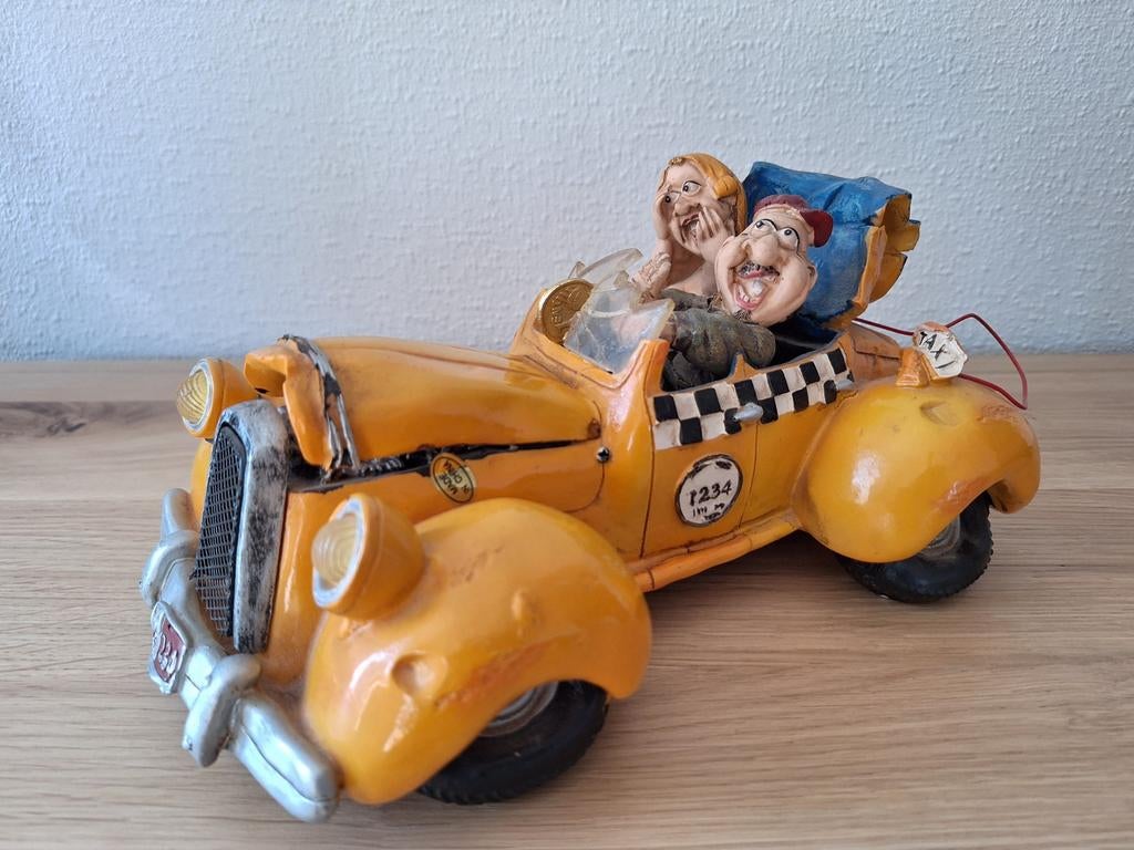 Spaarpot gele taxi met figuren, Ophalen of Verzenden