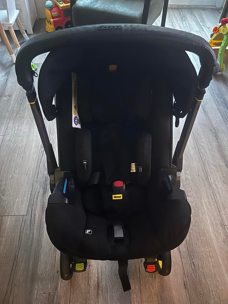 Doona i Autostoel & Kinderwagen met isofix en regenhoes, Overige merken, Zo goed als nieuw, Isofix, 0 t/m 13 kg