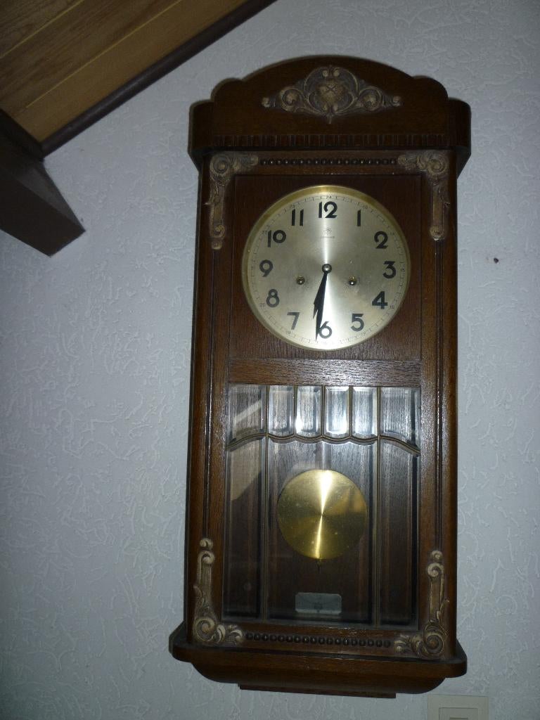 antieke wandklok, Ophalen
