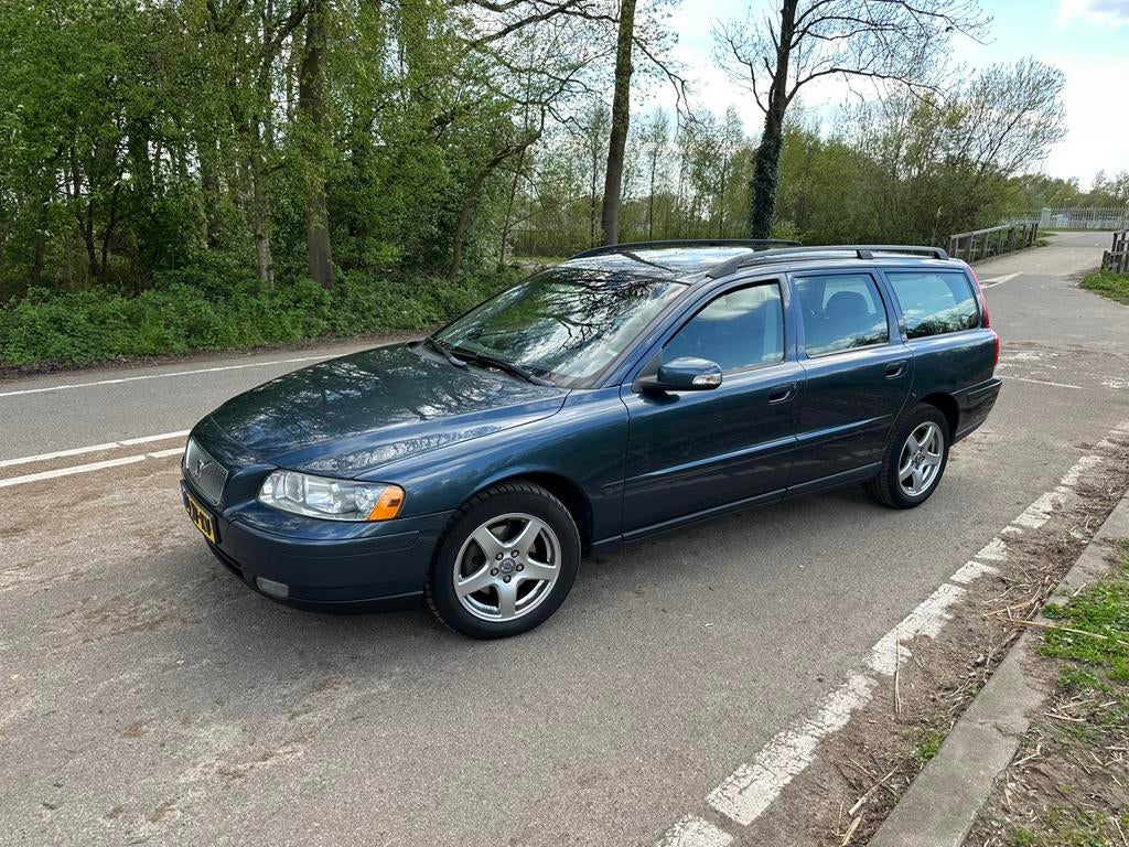 Volvo V70 2.4 170PK AUT 2007 Blauw, Youngtimer, 1800 kg, Blauw, Leder en Stof, Stationwagon
