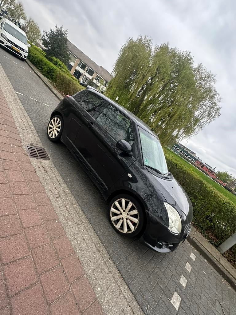 Suzuki Swift 1.6 3D Sport 2007 Zwart, Auto's, Suzuki, Voorwielaandrijving, 1005 kg, 125 pk, 40 €/maand