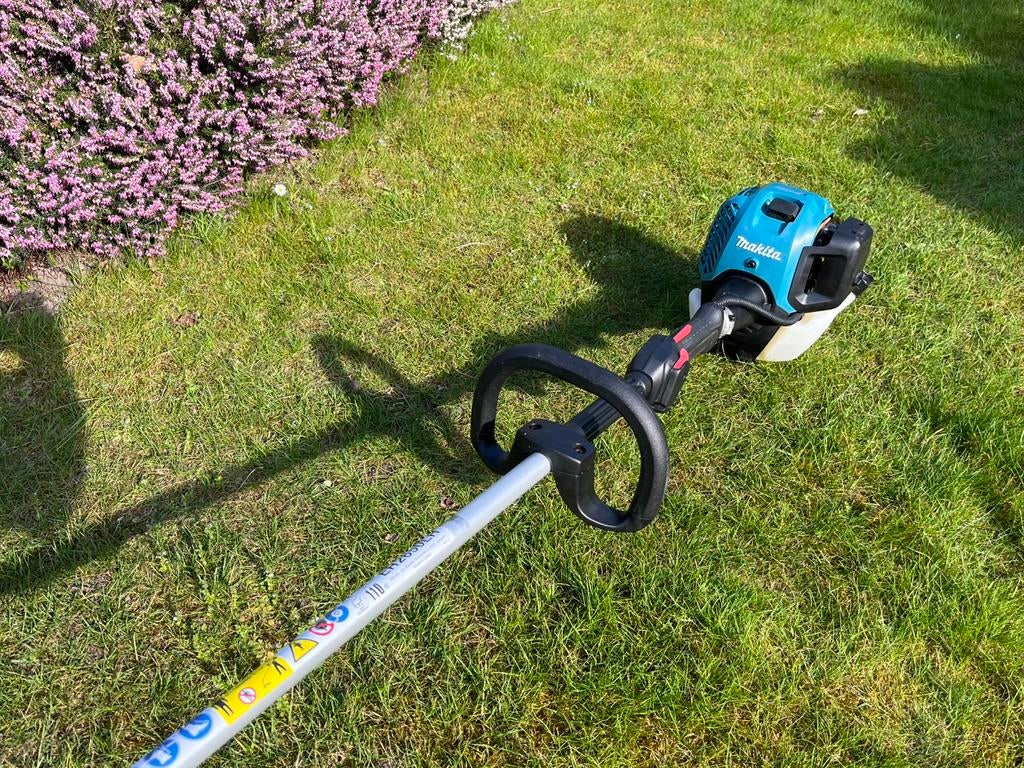 Makita trimmer 4 takt ., Ophalen of Verzenden, Zo goed als nieuw, 10 tot 30 cm, Benzine