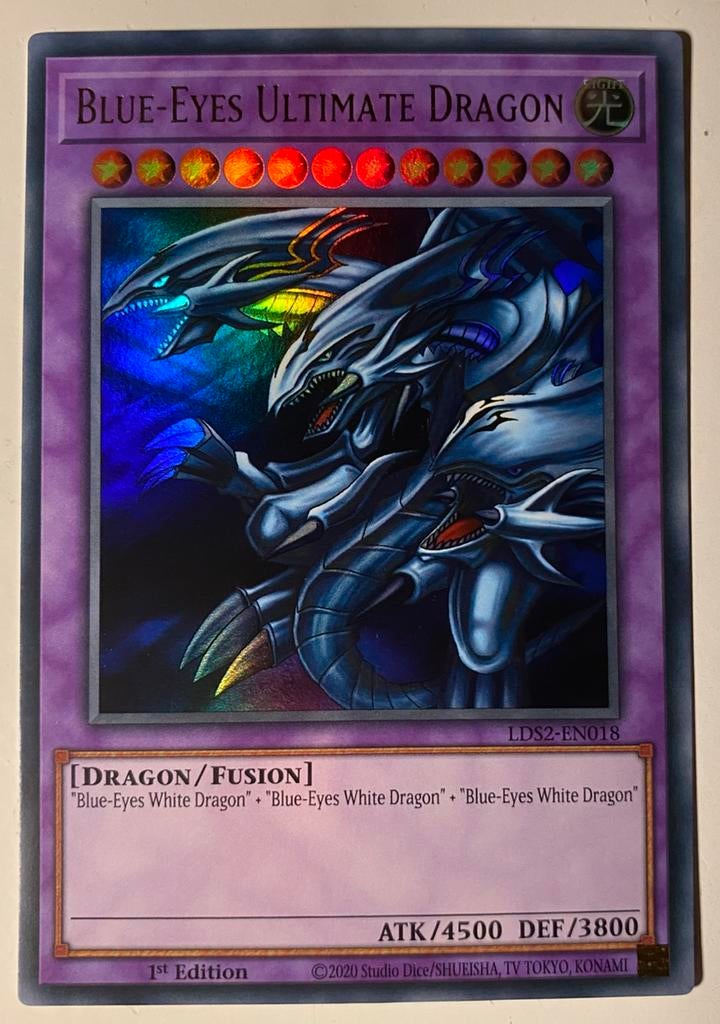 Yu-Gi-Oh! Blue-Eyes Ultimate Dragon LDS2 1st Edition !, Hobby en Vrije tijd, Verzamelkaartspellen | Yu-gi-Oh!, Ophalen of Verzenden