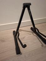 Gitaarstandaard voor akoestische gitaar, Ophalen