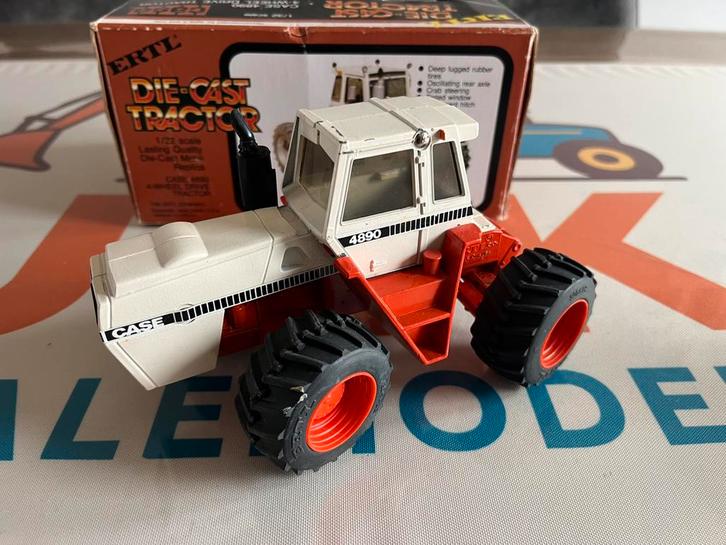 Case 4890 4 wiel gestuurde tractor Ertl 1637, Hobby en Vrije tijd, Modelauto's | 1:32, Zo goed als nieuw, Tractor of Landbouw