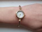 Nieuwe goudkleurige armband horloge met witte wijzerplaat., Ophalen of Verzenden, Nieuw, Goud, Staal