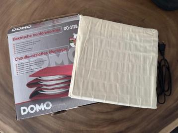 DOMO bordenverwarmer beschikbaar voor biedingen