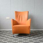 1x Montis Windy fauteuil + bijbehorende hocker - oranje, Huis en Inrichting, Ophalen of Verzenden, Zo goed als nieuw, Leer