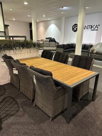 Tuinset 6 wicker stoelen en een aluminium tafel met houtlook beschikbaar voor biedingen