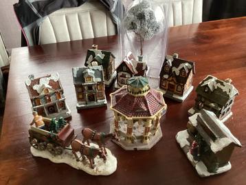 Diverse huisjes met verlichting voor kerstdorp beschikbaar voor biedingen