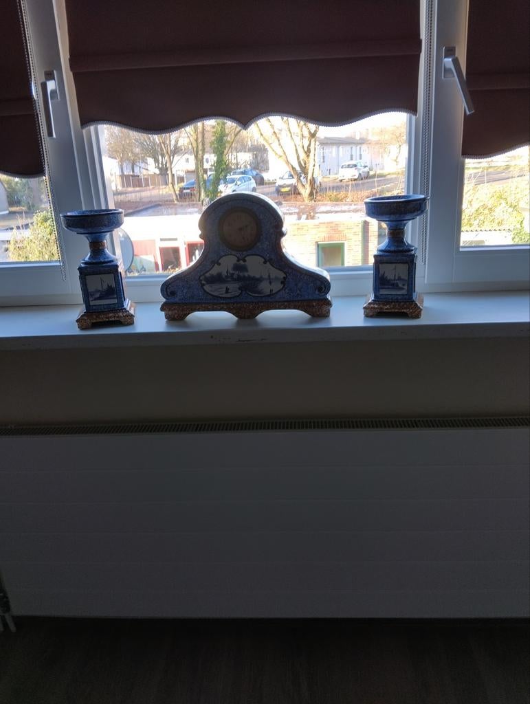 Delftsblauwe klok met vazen, Ophalen