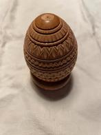 Houten eieren, Ophalen