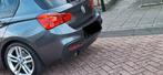 BMW 1-Serie 118i 136pk Aut 2016 Grijs, Auto's, BMW, 1295 kg, Origineel Nederlands, 650 kg, 19 km/l