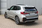 BMW iX1 xDrive30 High Executive M Sport / Panoramadak / Trek, Gebruikt, Zwart, Met garantie (alle), 420 min