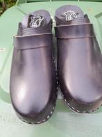 klomp schoenen, Ophalen