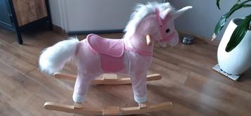 roze hobbelpaard beschikbaar voor biedingen