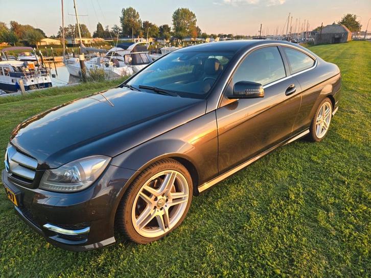 Mercedes-Benz C-Klasse AMG LineC180 BE Coupe Aut7 2014 Zwart, Auto's, Mercedes-Benz, Particulier, C-Klasse, Benzine, C, Coupé