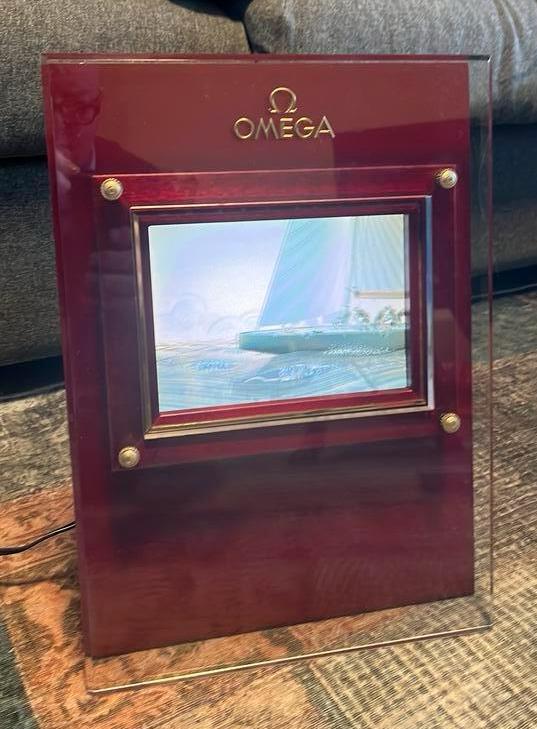 Omega dealer display etalage vitrine bewegend beeld, Sieraden, Tassen en Uiterlijk, Overige Accessoires, Zo goed als nieuw, Verzenden