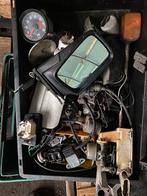 Krat onderdelen. Spiegels, bobines klokjes toerenteller etc., Ophalen