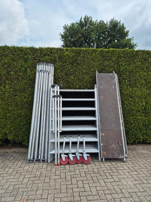 Aluminium rolsteiger ruim 11 meter werkhoogte, Doe-het-zelf en Verbouw, Steigers, Gebruikt, Rolsteiger of Kamersteiger, 5 meter of hoger
